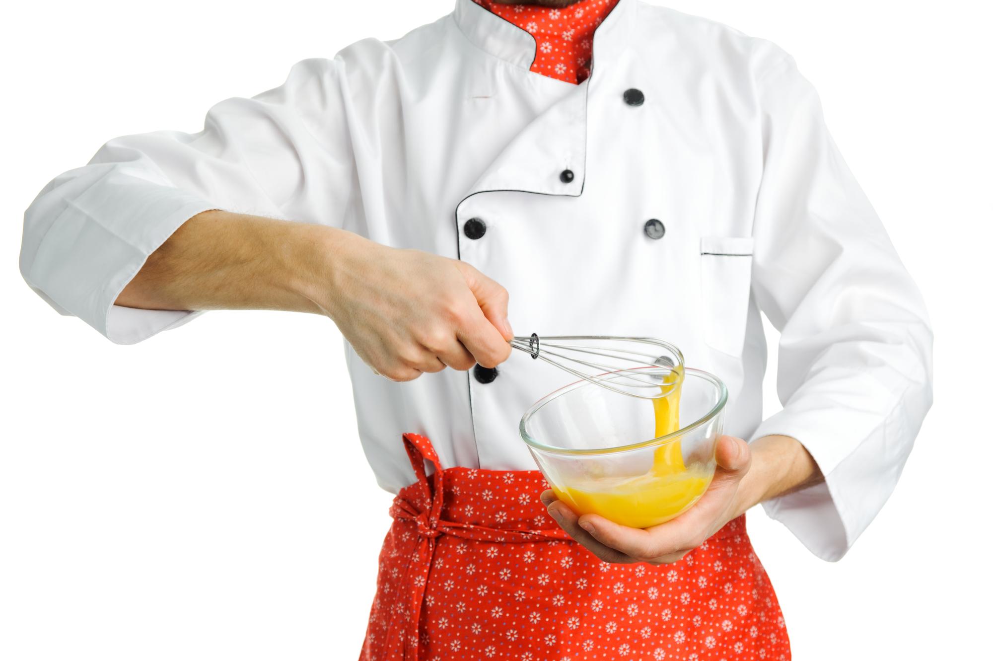 Student plating a dish during an online class